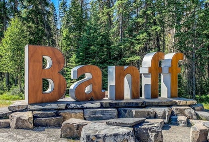 Banff welcome sign with trees